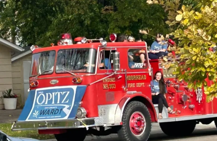 Moorhead City Council candidate Sarah Opitz’s use of fire truck during parade goes to a hearing — Hillsboro Government news